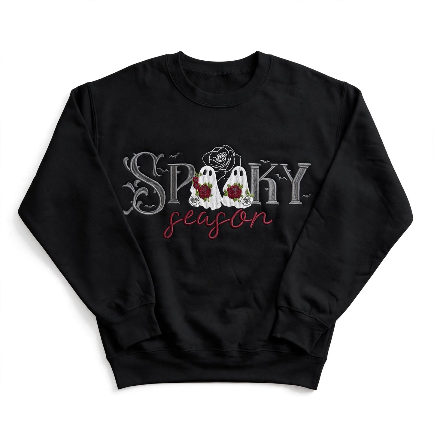 A black crewneck sweatshirt featuring a 'Spooky Season' graphic on the chest with two white ghosts holding red roses, set against a plain white background.