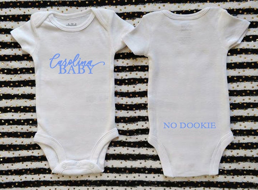 Carolina baby onesies with No DOOKIE on back. UNC baby bodysuit . Customize bodysuits. Carolina-Duke rivalry onesies.