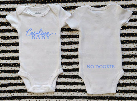 Carolina baby onesies with No DOOKIE on back. UNC baby bodysuit . Customize bodysuits. Carolina-Duke rivalry onesies.